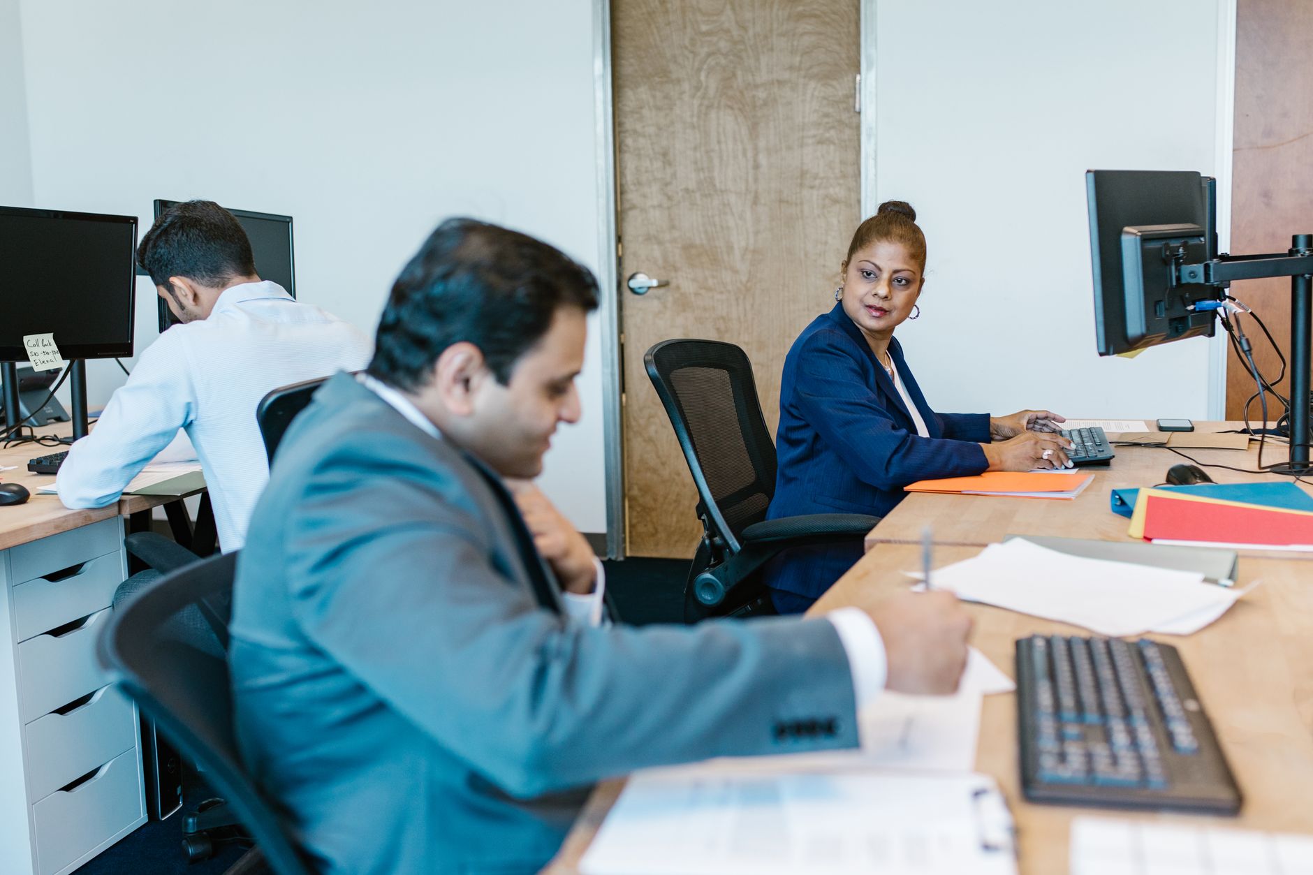 Indian business team discussion for Bulk Vouchers article
