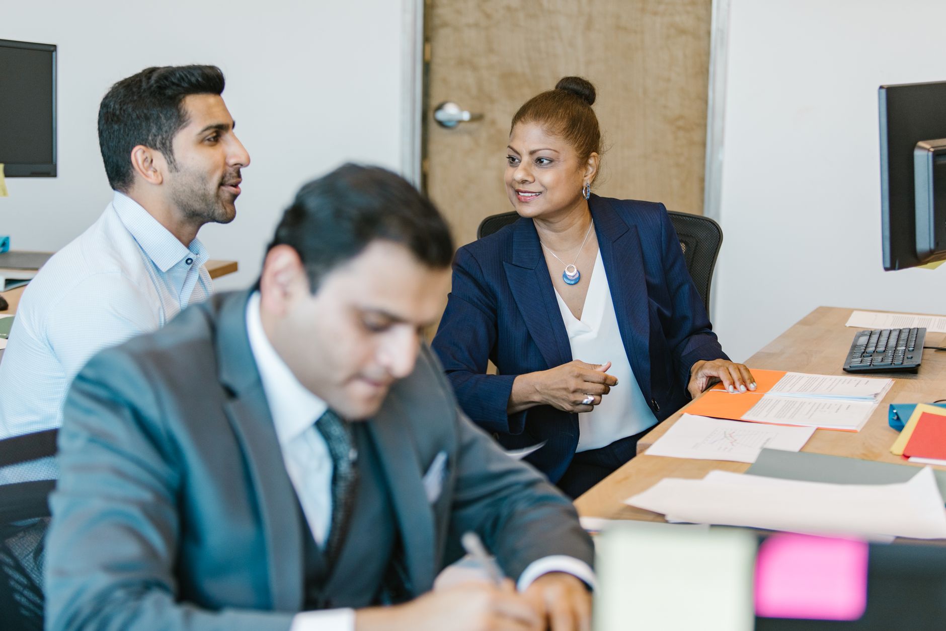 Indian business team discussion for Bulk Vouchers article