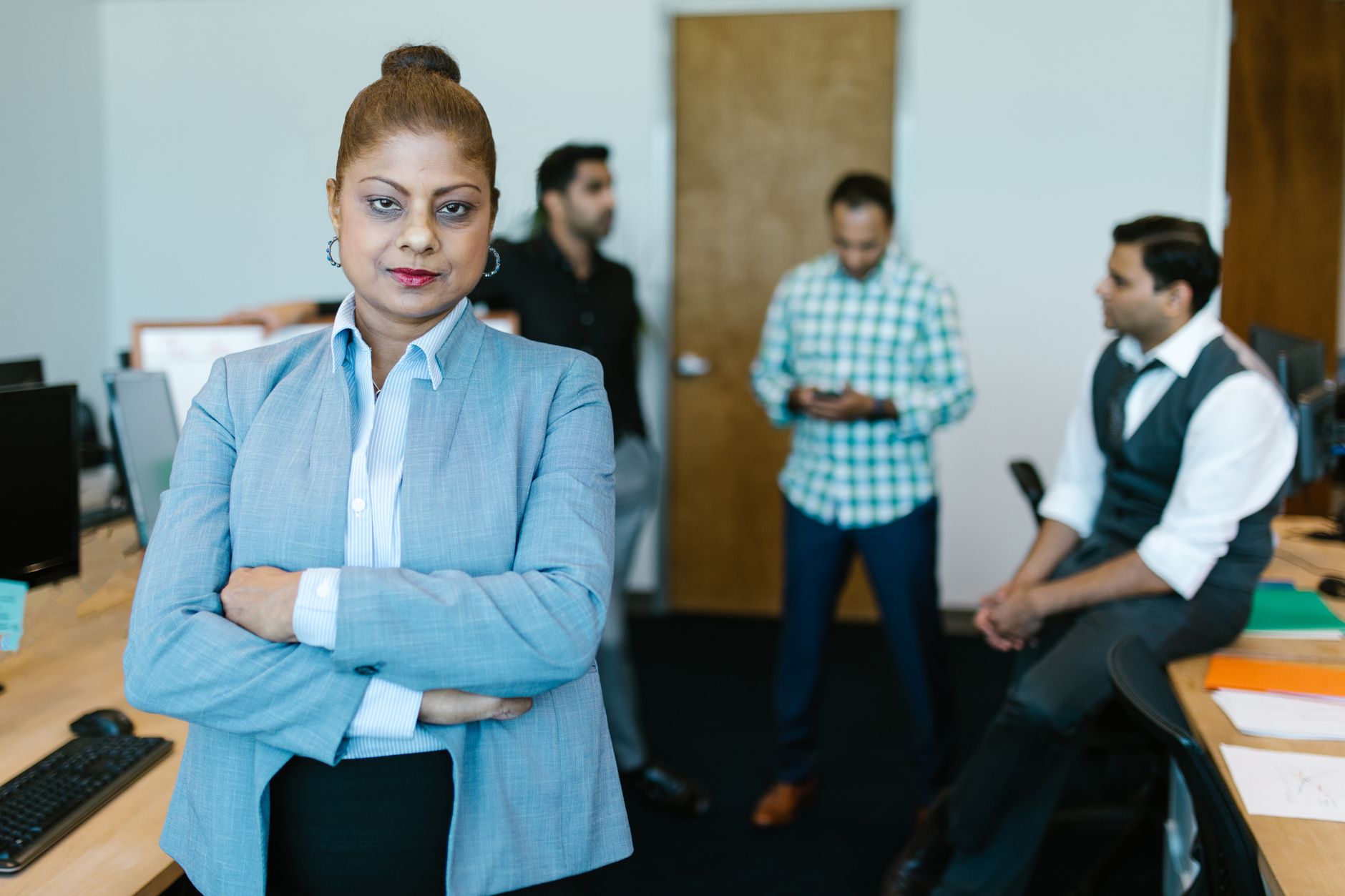 Indian business team discussion for Bulk Vouchers article