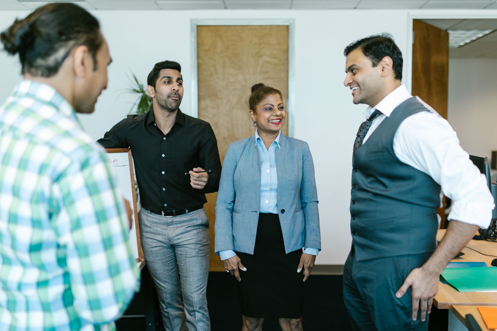 Indian business team discussion for Bulk Vouchers article