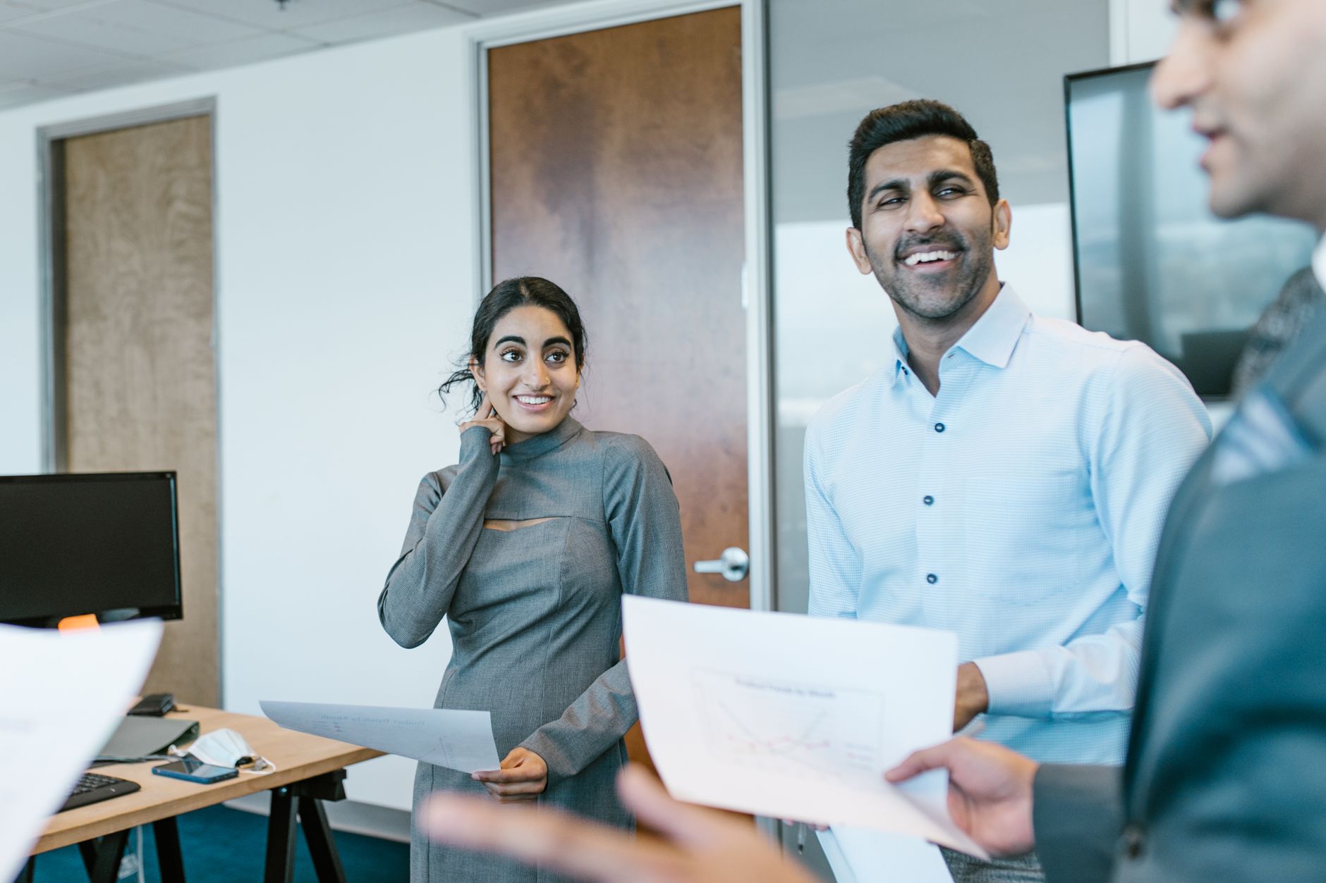 Indian business team discussion for Employee Recognition article