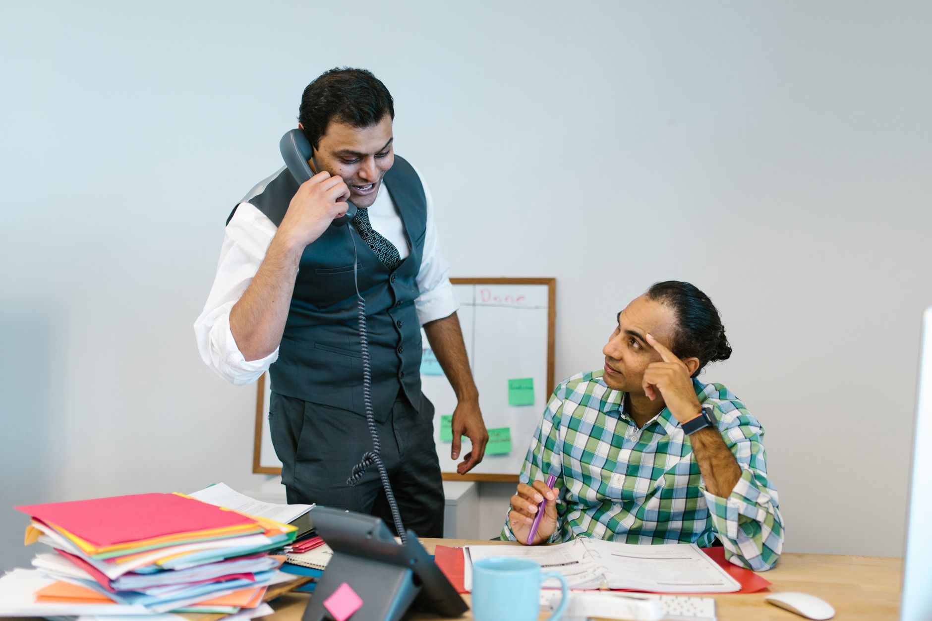 Indian business team discussion for Employee Recognition article