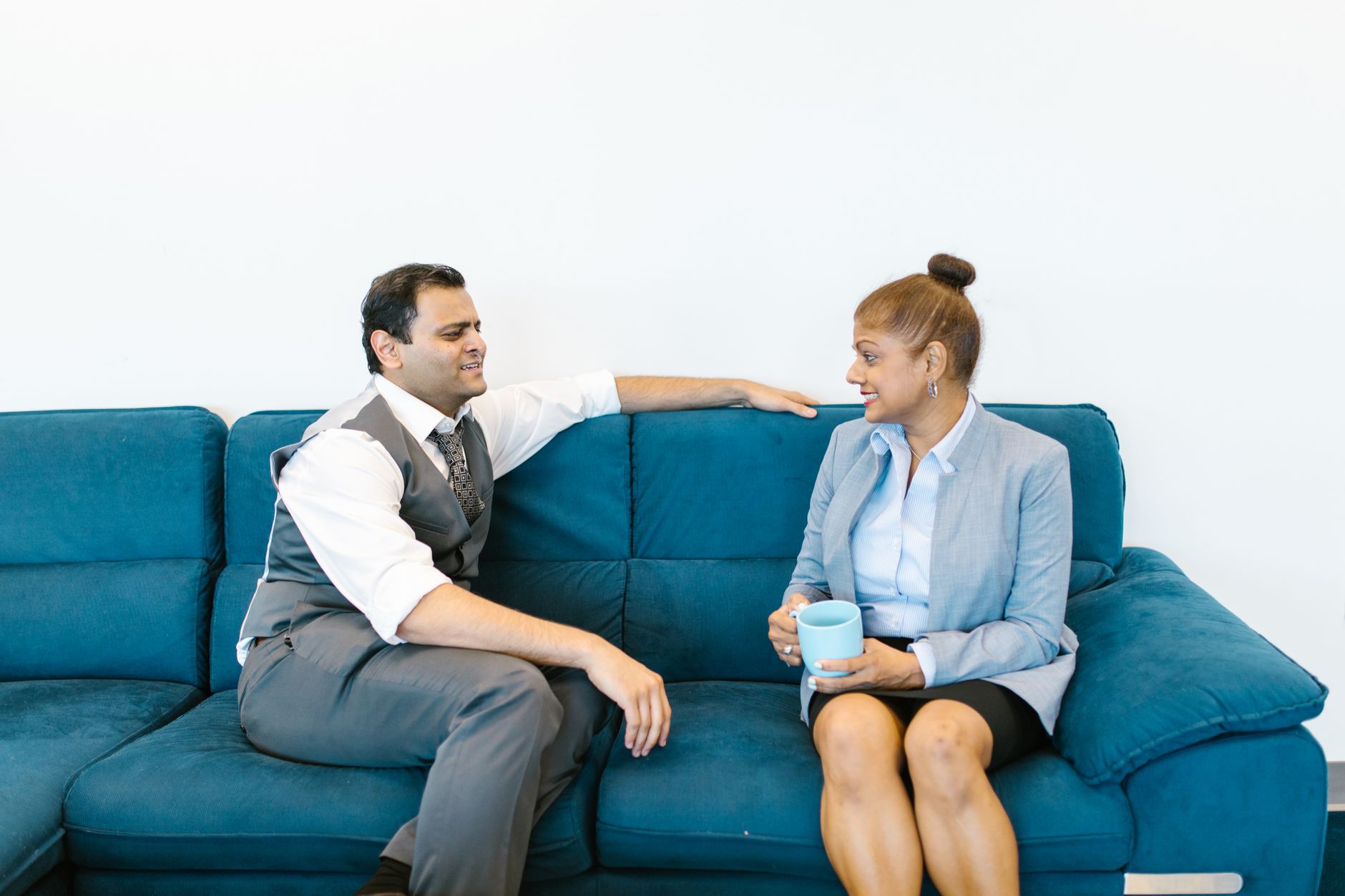 Indian business team discussion for Employee Recognition article