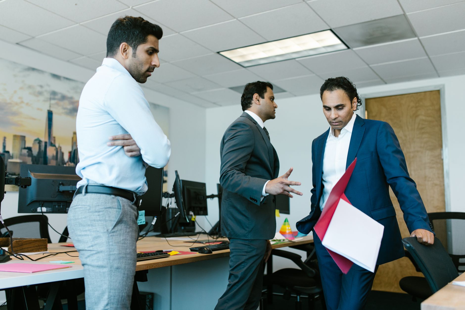 Indian business team discussion for Employee Recognition article