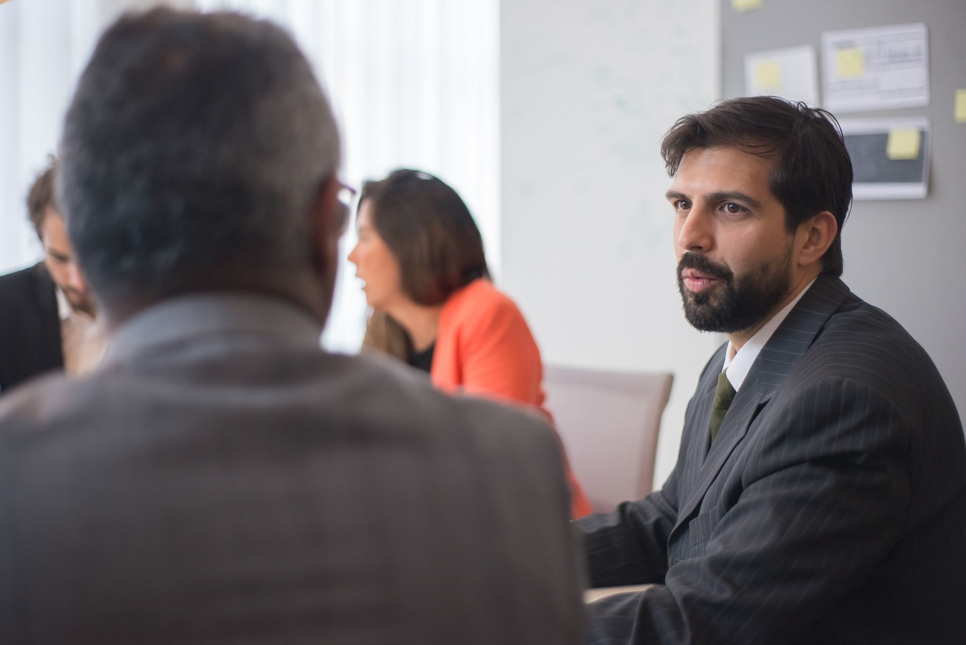 Indian corporate team discussing partner deal registration incentives in an office meeting